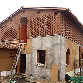 Thermal insulating wall with wood fiber and BetonWood
