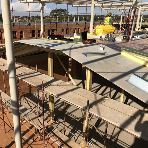 Cement bonded particle board roof in Uganda - Emergency