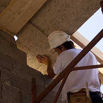 Cement bonded particle board and wood fiber roof